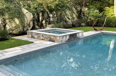 Bluestone patio with raised spa and fireplace