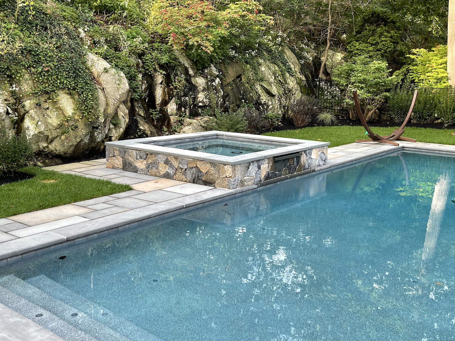 Bluestone patio with raised spa and fireplace