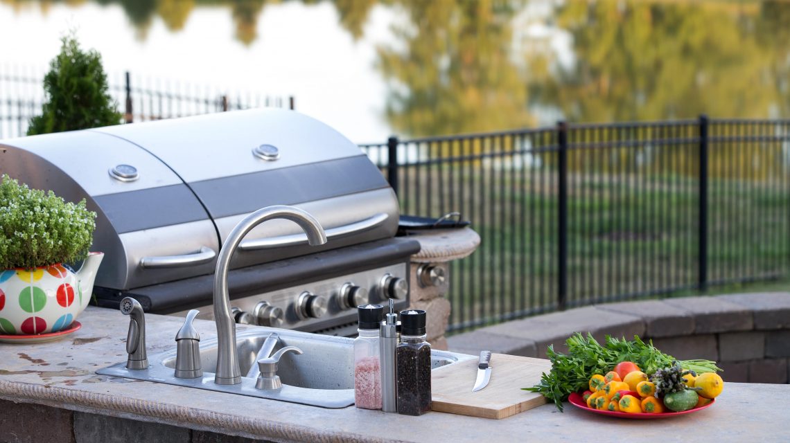 grill and outdoor kitchen area