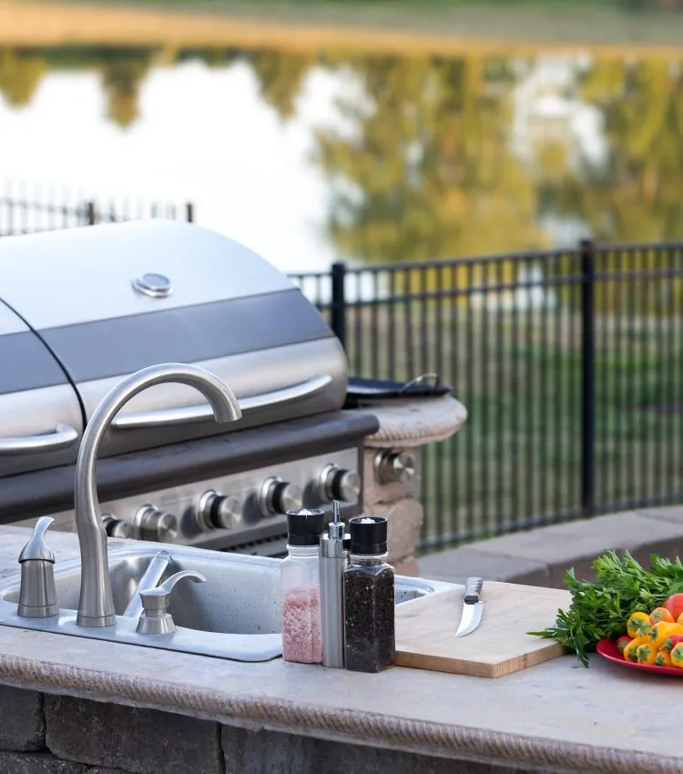 grill and outdoor kitchen area